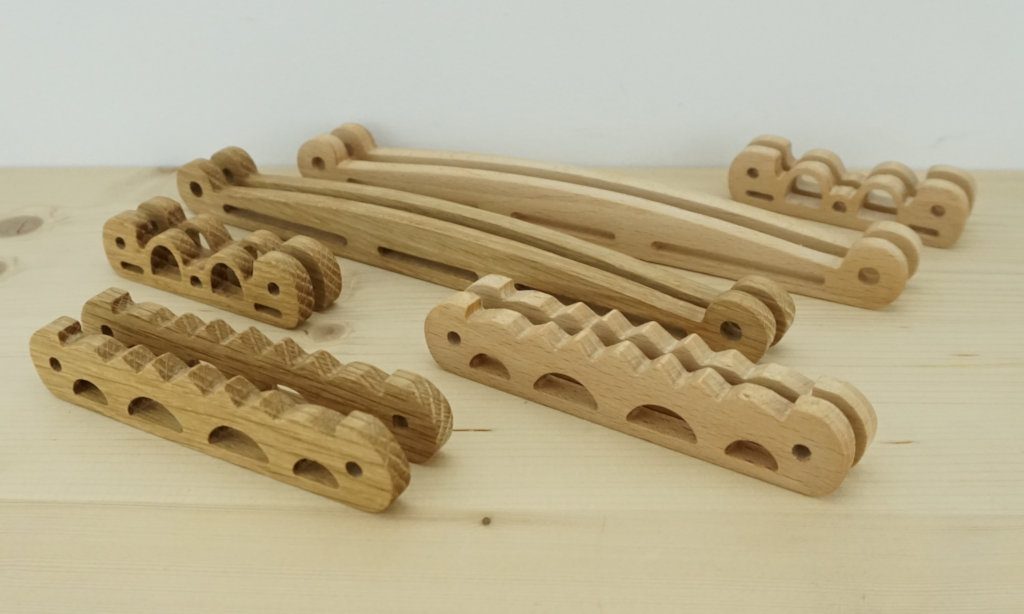 Piezas bolso vikingo en madera con CNC